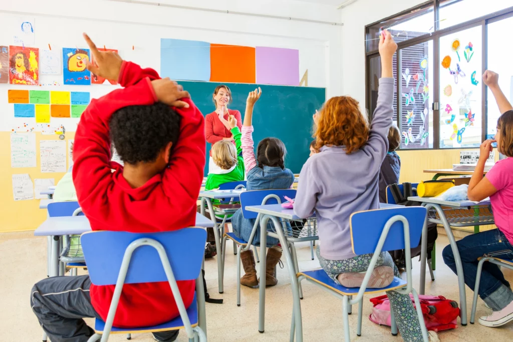 Rear View Of Primary Schoolgirls And Boys With Han 2025 04 04 13 07 22 Utc